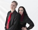 Summer and Roger standing side by side on a plain white background #2